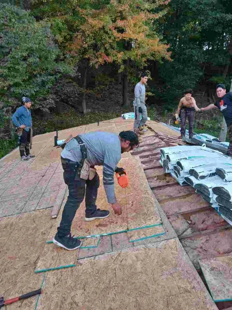 Slide of Reyes Roofing And More