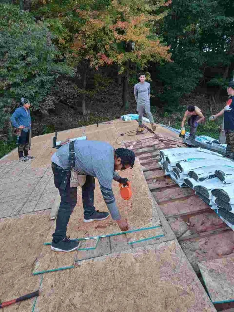 Slide of Reyes Roofing And More