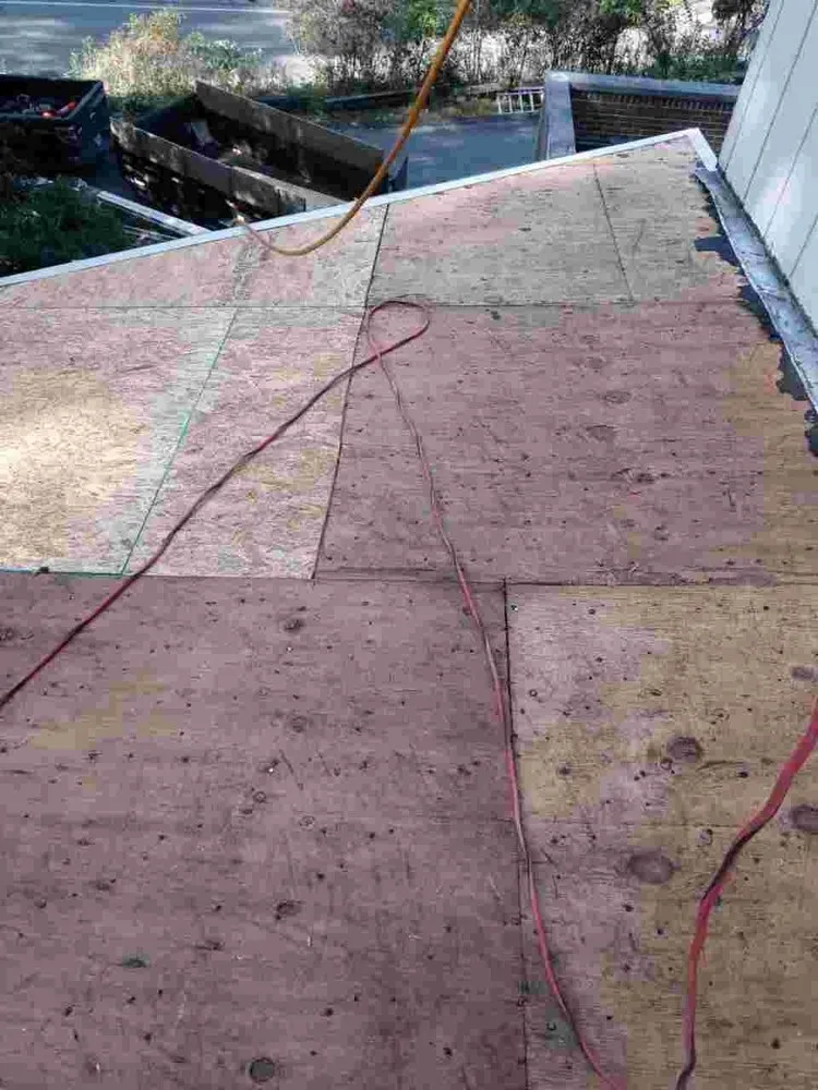 Slide of Reyes Roofing And More