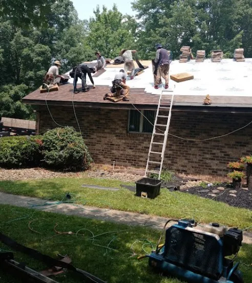 Slide of Reyes Roofing And More