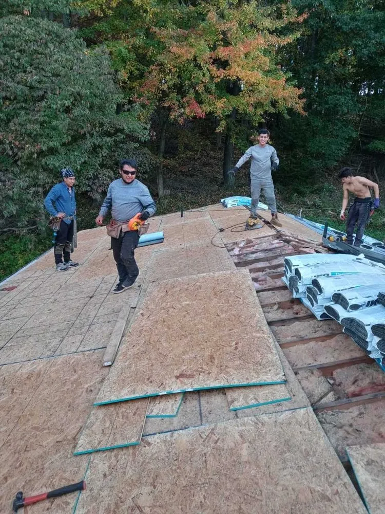 Slide of Reyes Roofing And More