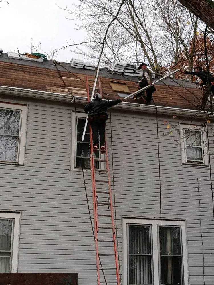 Slide of Reyes Roofing And More