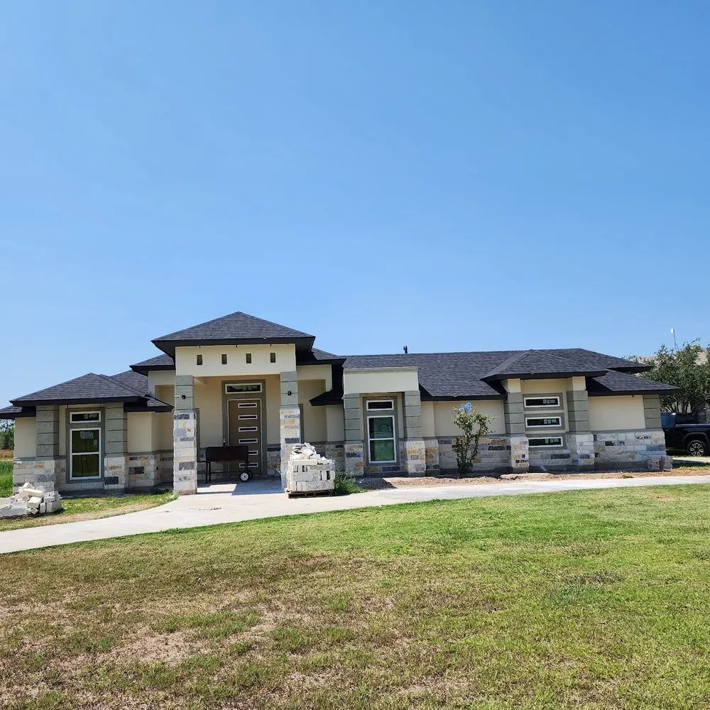 Slide of Reyes Roofing