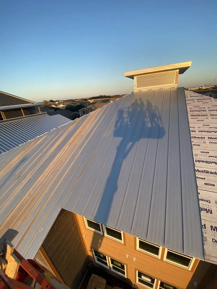 Slide of Reyes Roofing