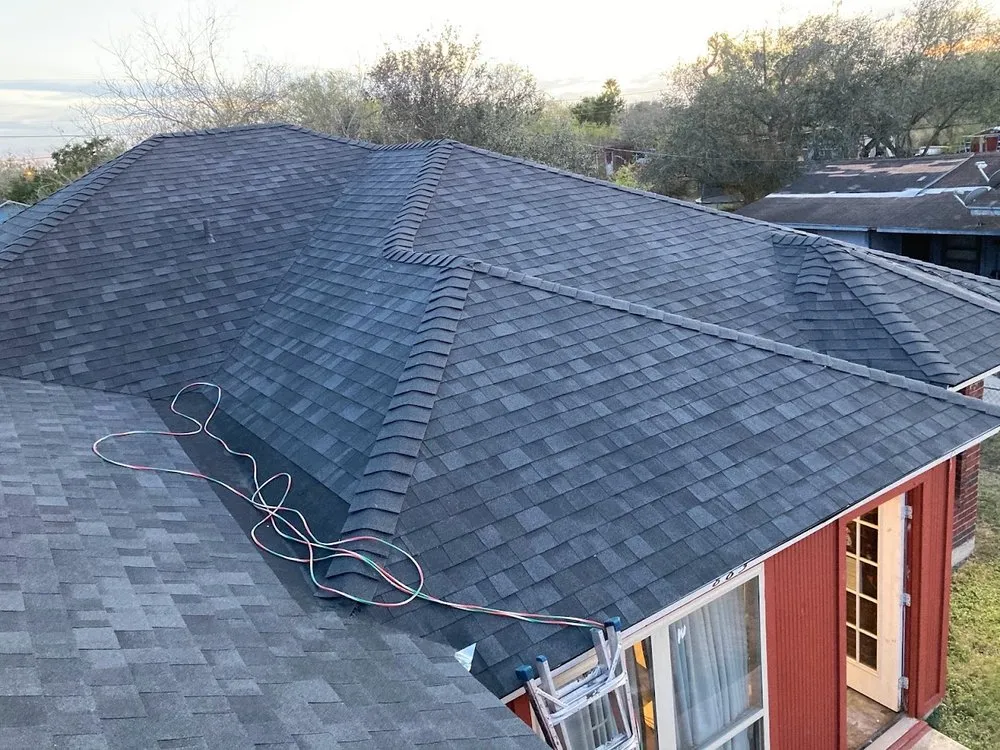 Slide of Reyes Roofing