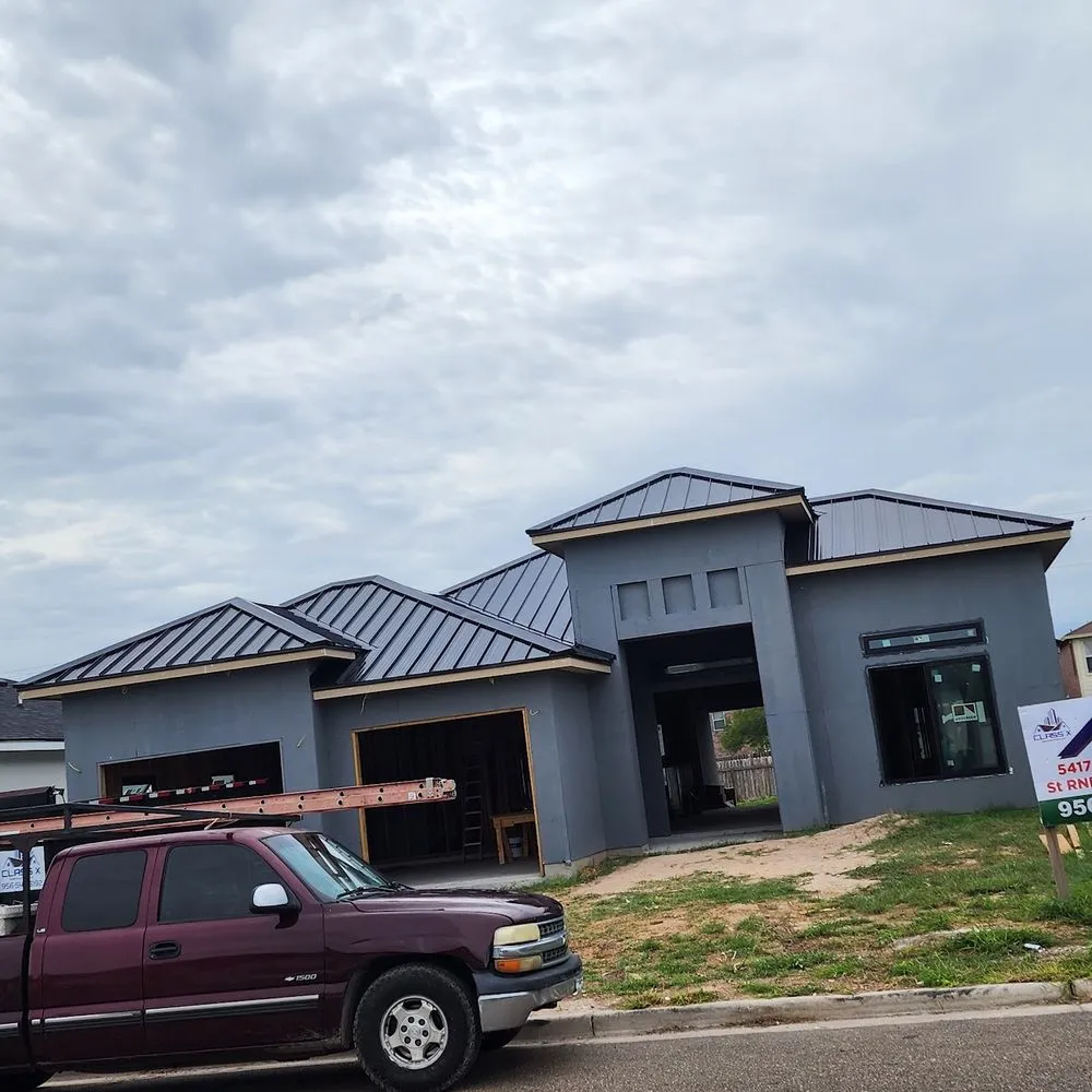 Slide of Reyes Roofing