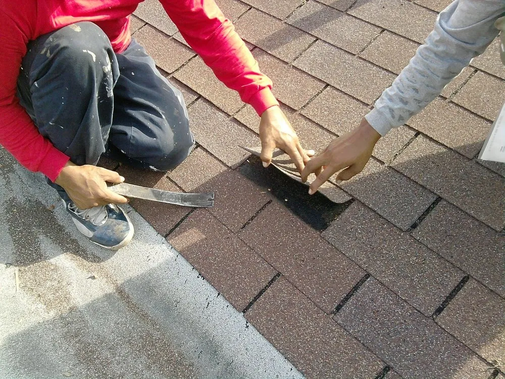 Slide of reyes roofing contractor