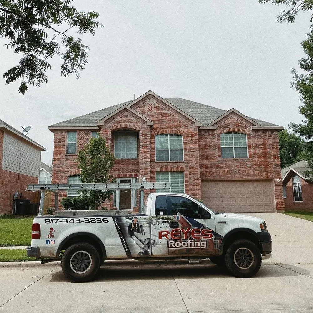 Slide of Reyes Roofing