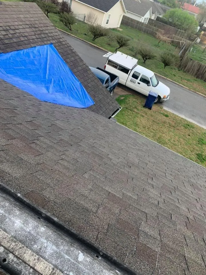 Licensed storm damage roof repair in Okay, OK by Reyes Roofing