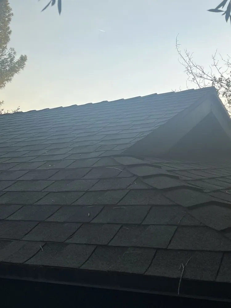 Slide of Reyes Roofing