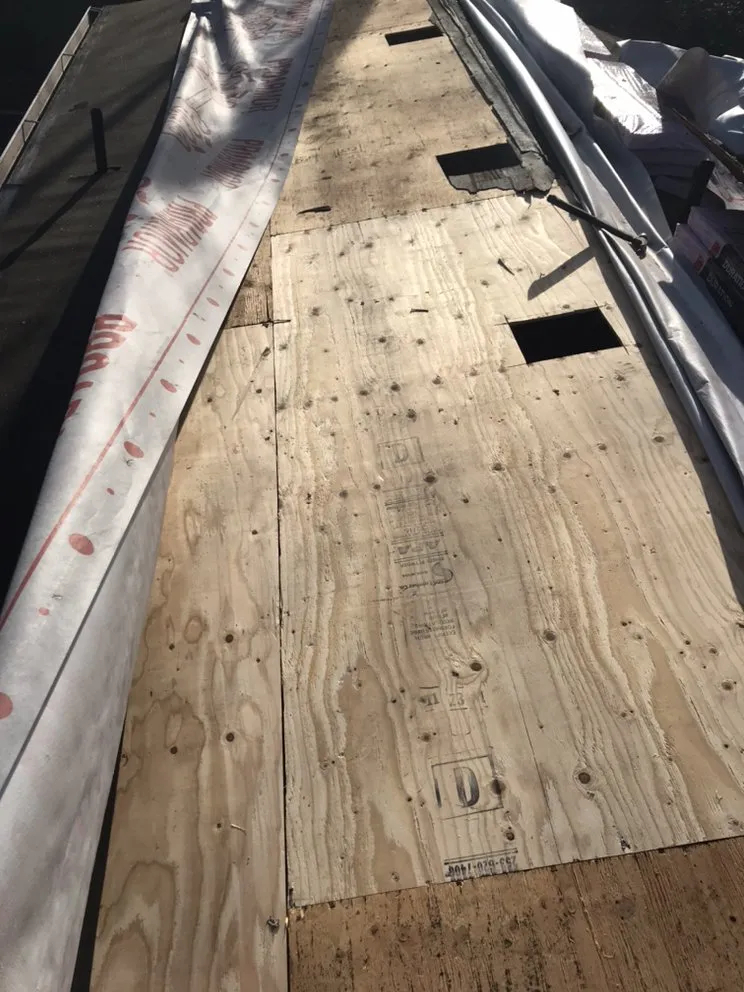 Slide of Reyes Roofing Pros