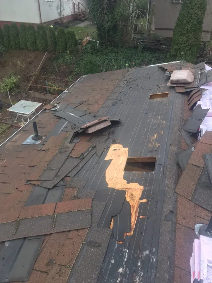 Slide of Reyes Roofing Pros