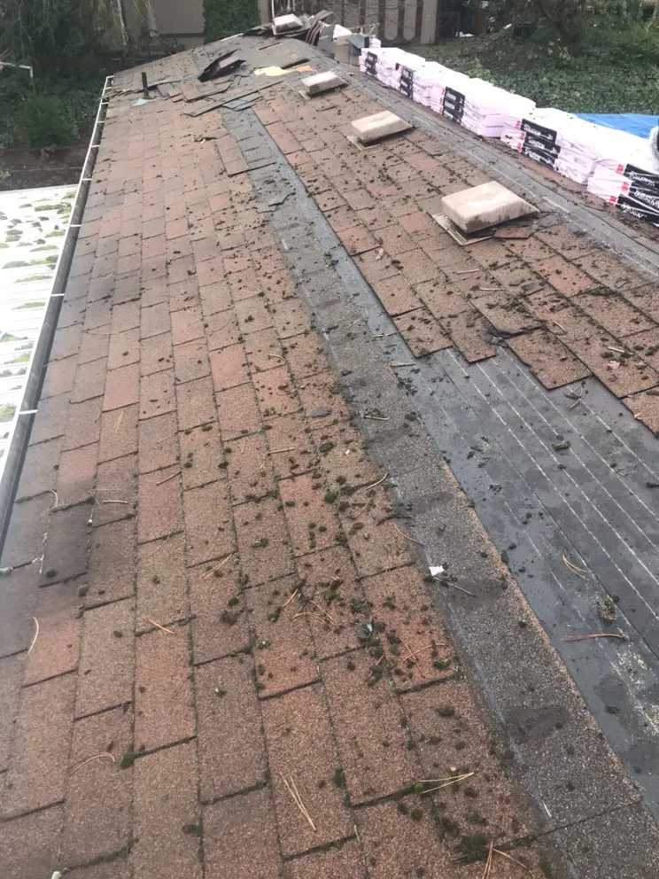 Slide of Reyes Roofing Pros