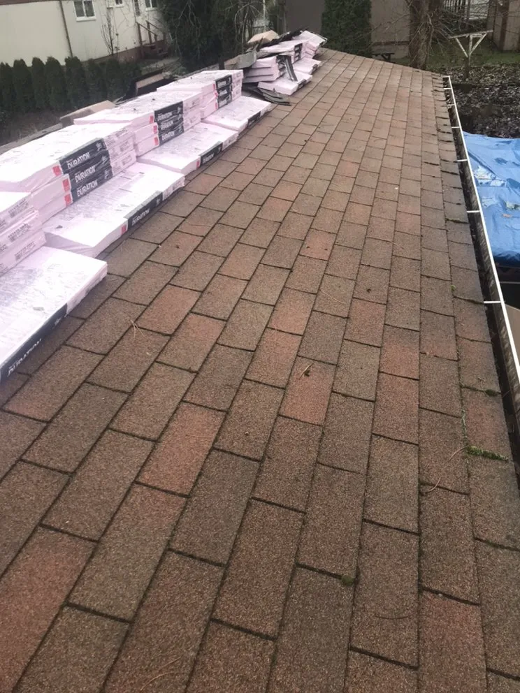 Slide of Reyes Roofing Pros