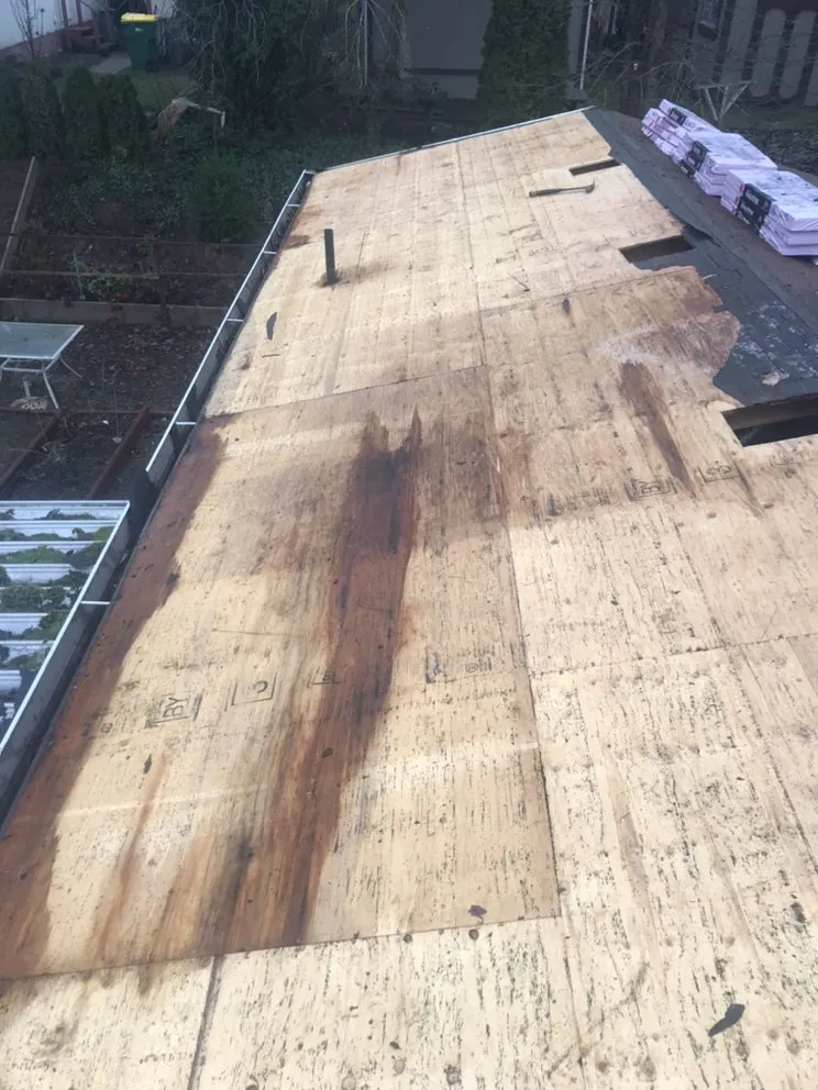 Slide of Reyes Roofing Pros