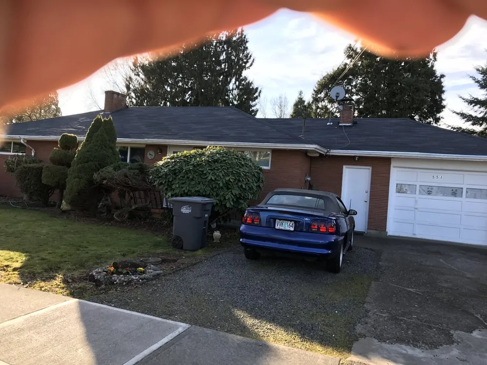 Slide of Reyes Roofing Pros