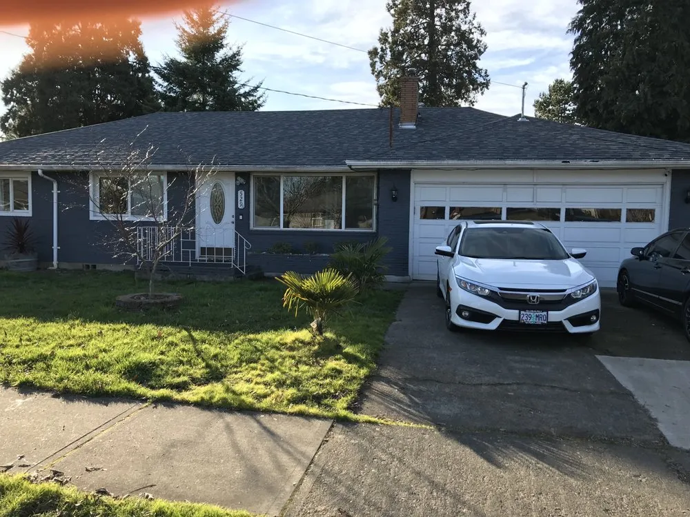 Slide of Reyes Roofing Pros