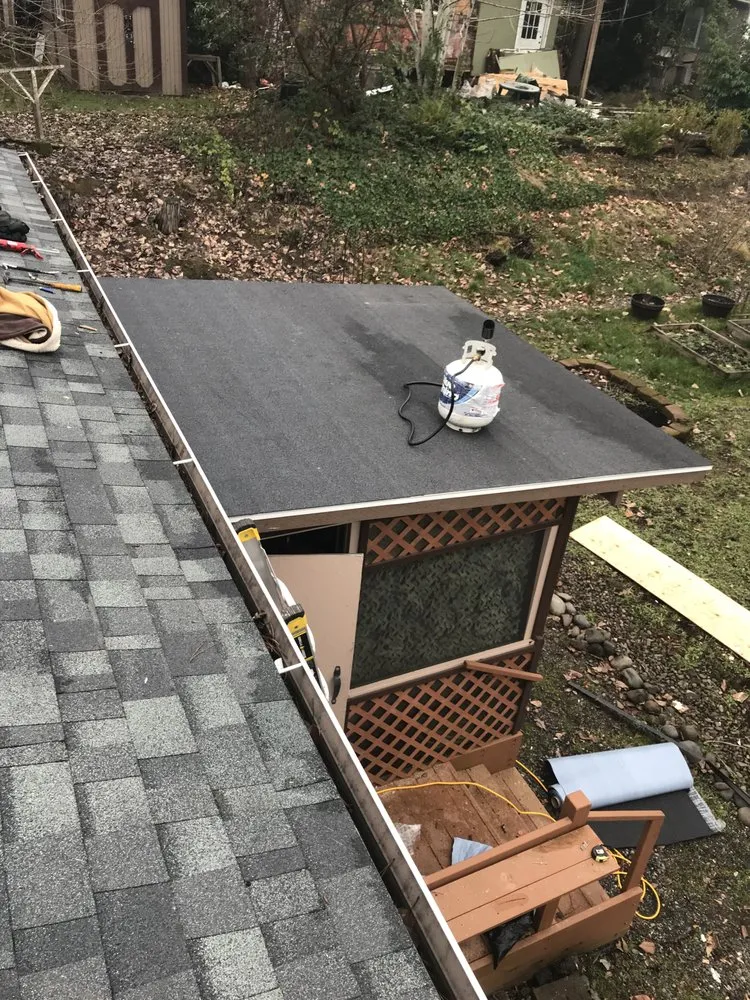 Slide of Reyes Roofing Pros