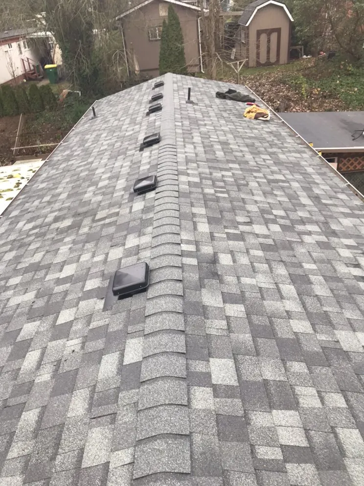 Slide of Reyes Roofing Pros