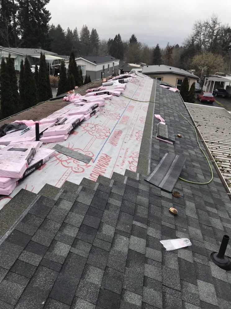 Slide of Reyes Roofing Pros