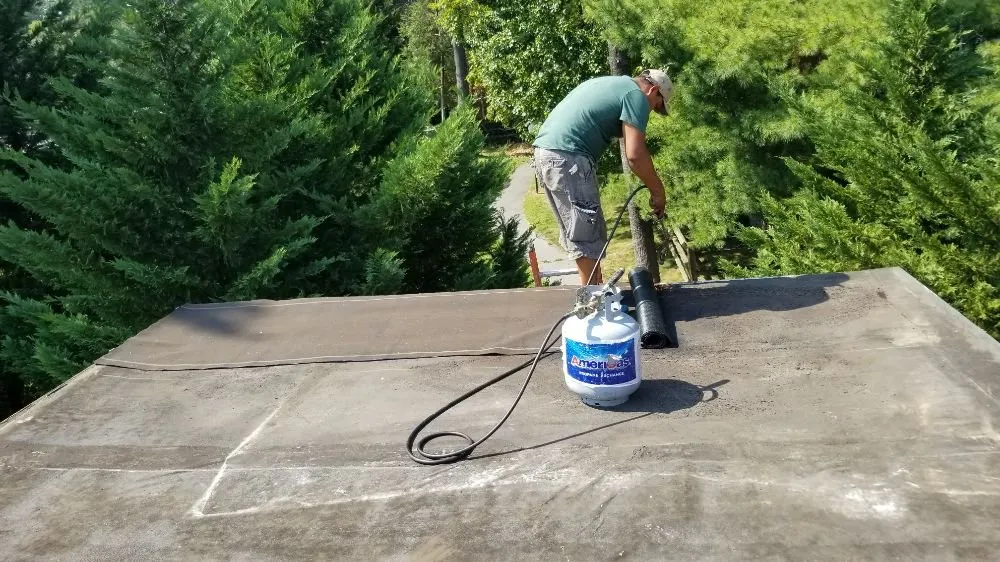 Slide of Reyes Roofing Services