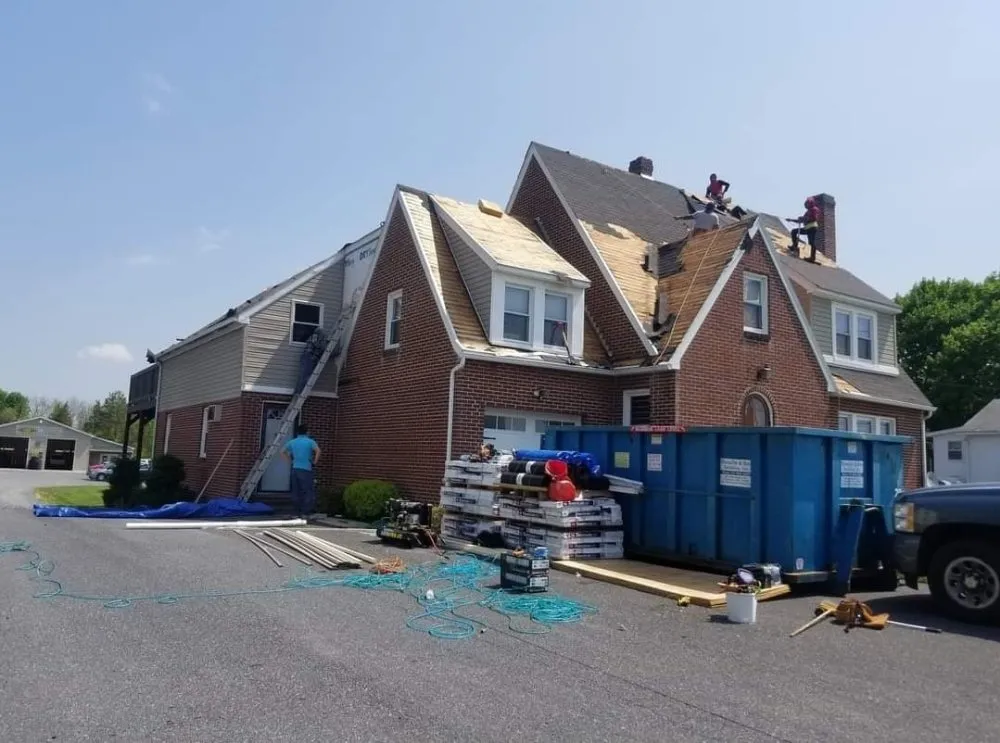 Slide of Reyes Roofing Services