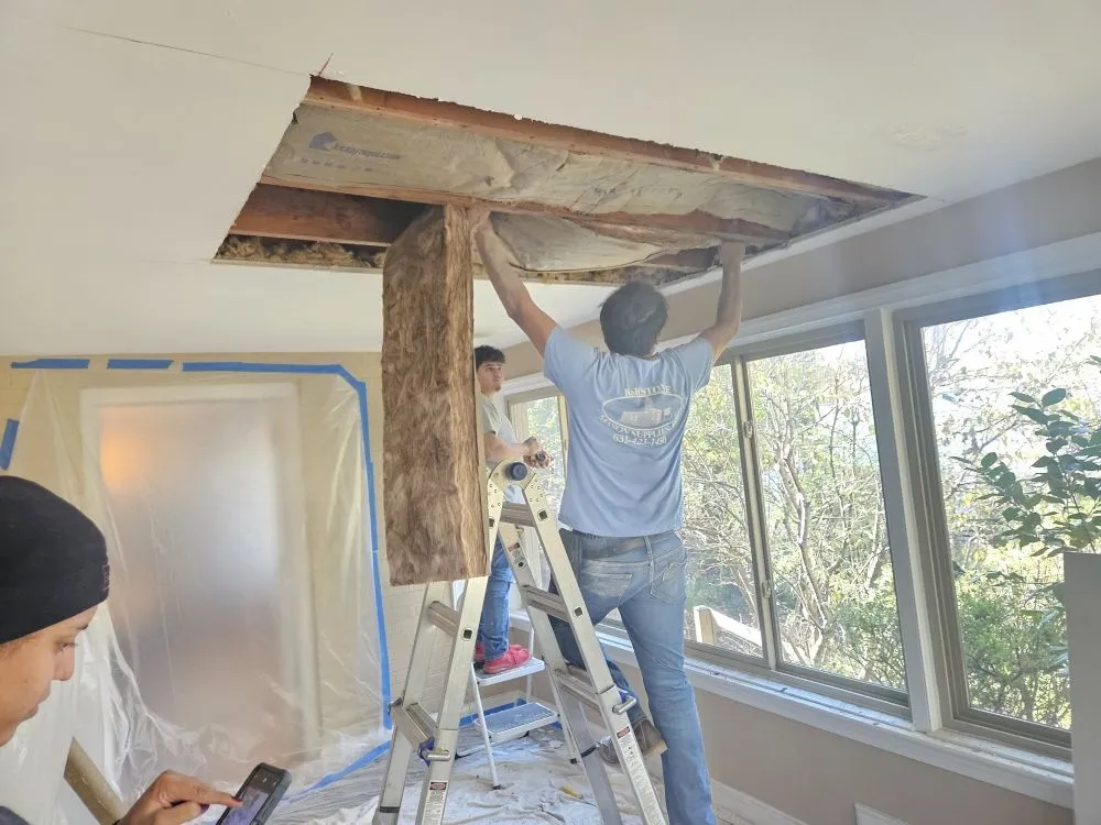 Slide of Reyes Roofing Services