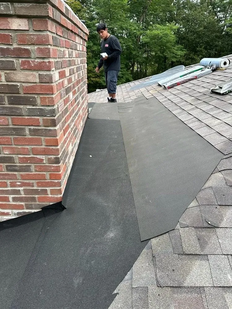 Slide of Reyes Roofing