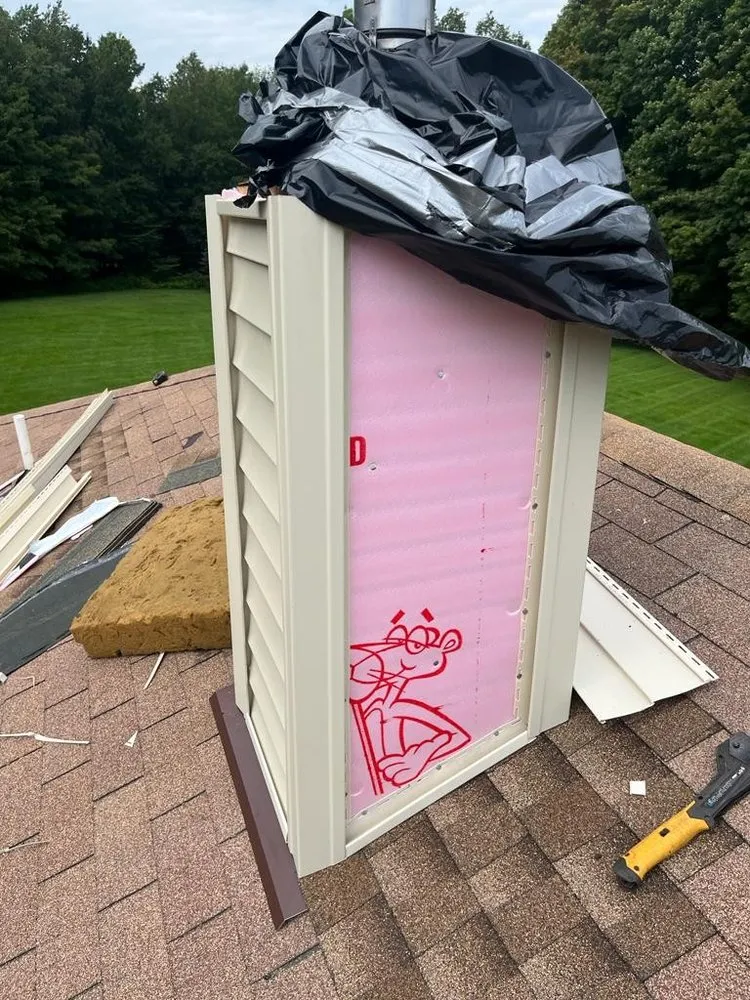 Slide of Reyes Roofing