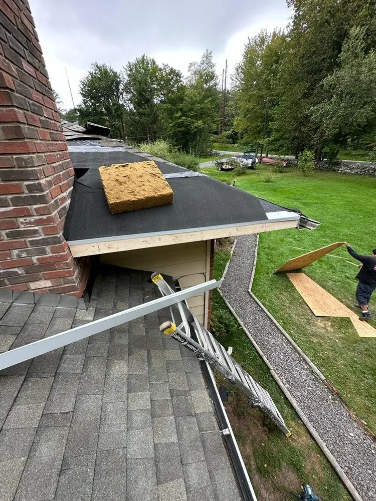 Slide of Reyes Roofing