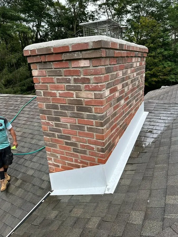 Slide of Reyes Roofing