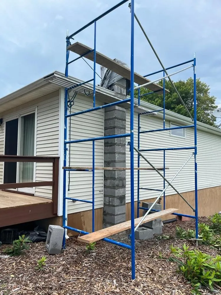 Slide of Reyes Roofing