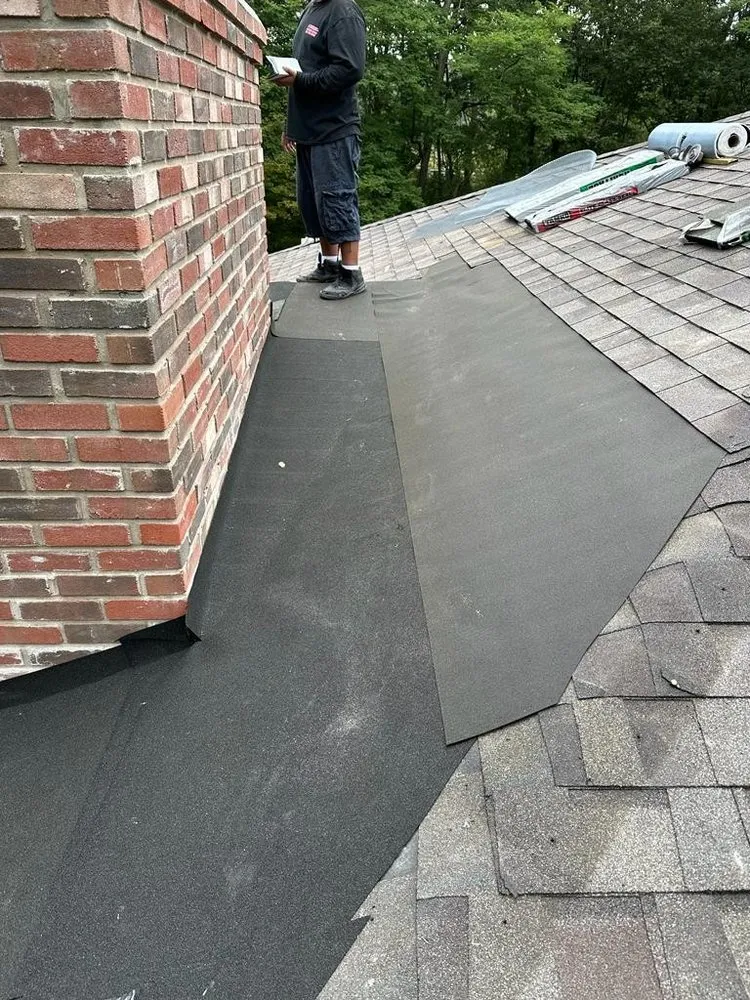 Slide of Reyes Roofing