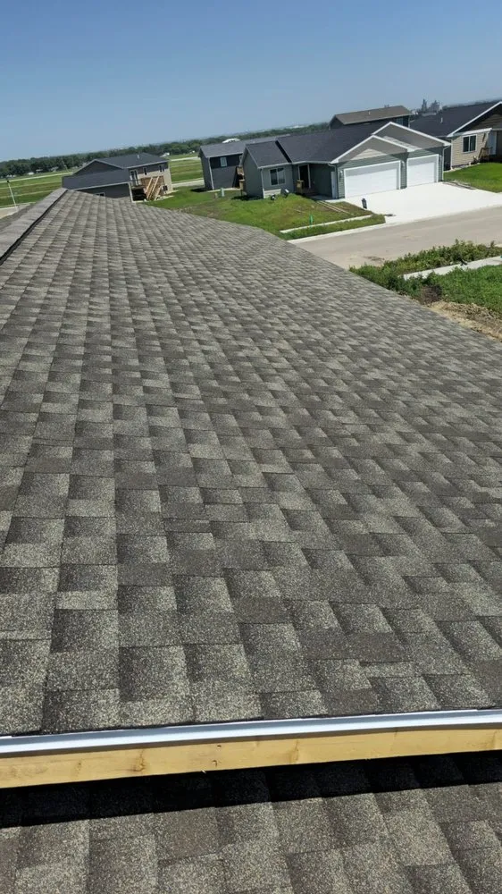 Slide of Reyes Roofing