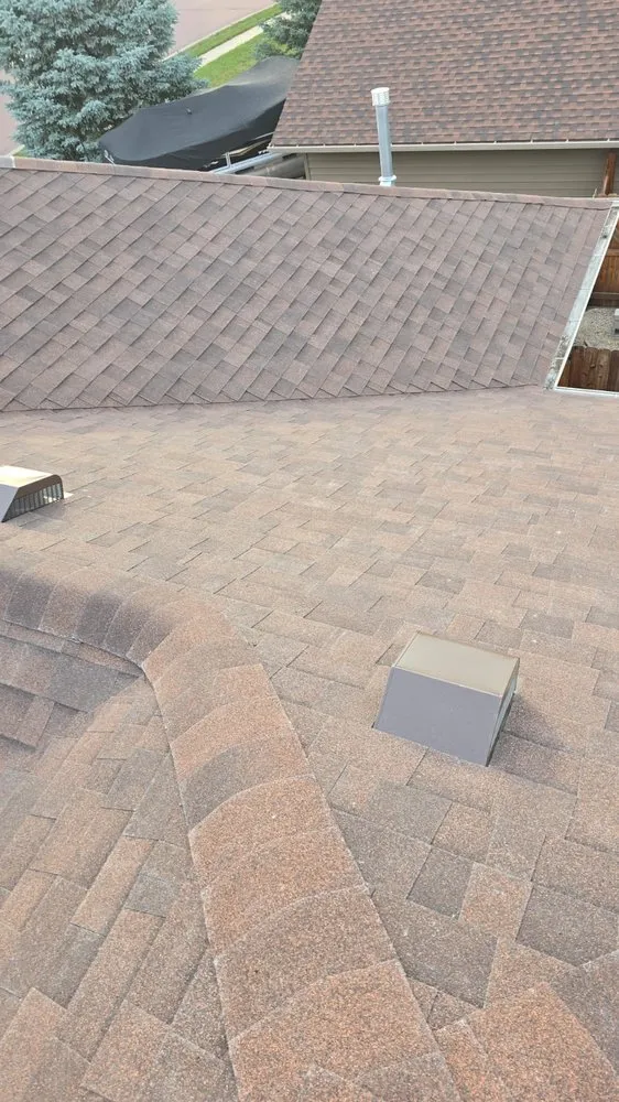 Slide of Reyes Roofing