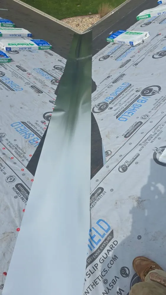 Slide of Reyes Roofing