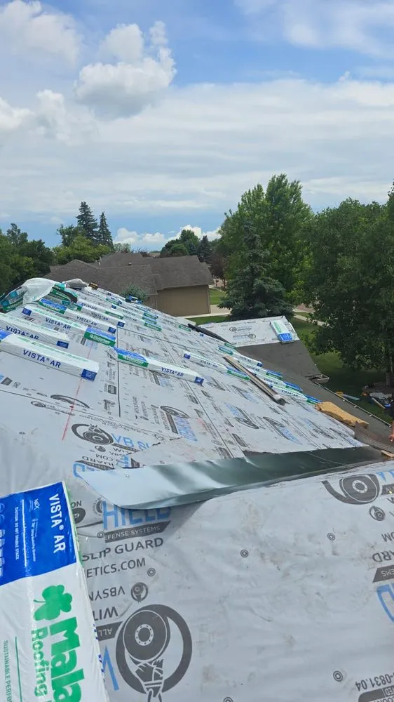 Slide of Reyes Roofing