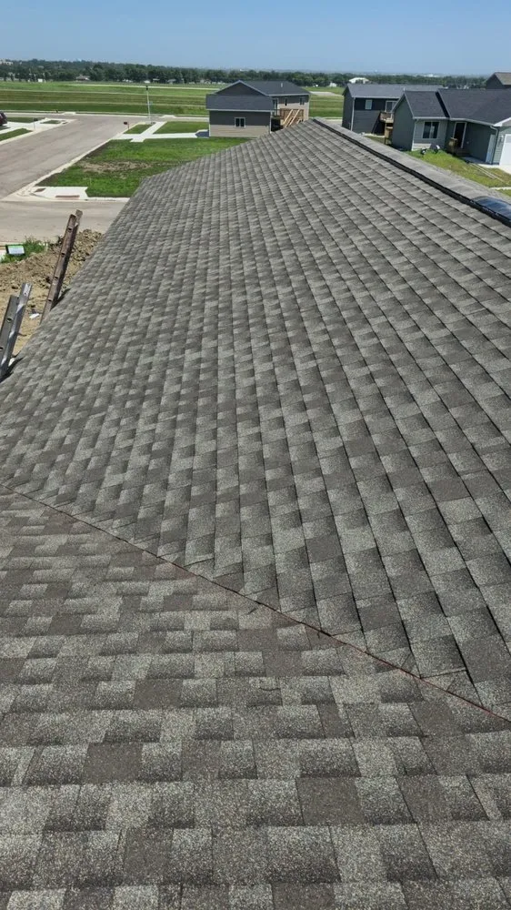 Slide of Reyes Roofing