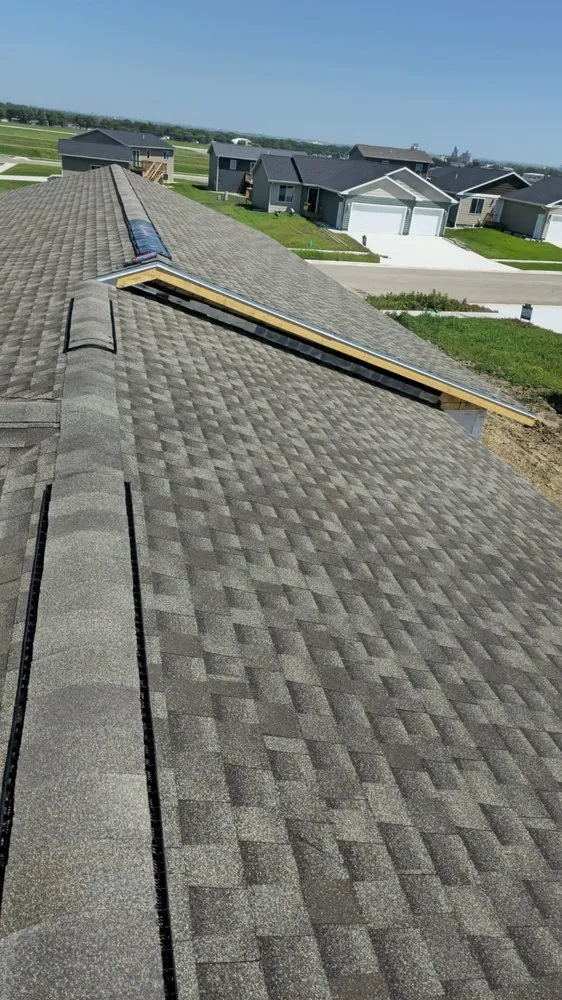 Slide of Reyes Roofing