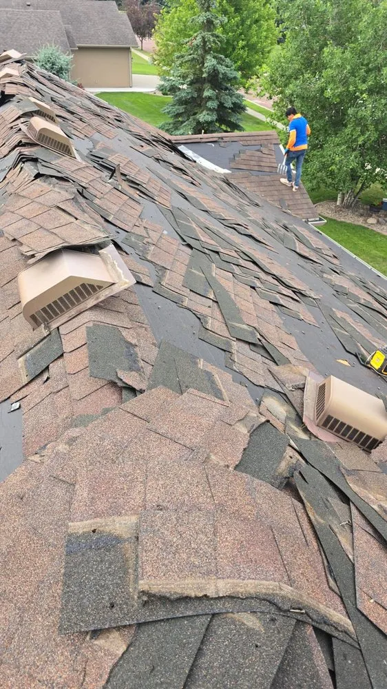 Slide of Reyes Roofing