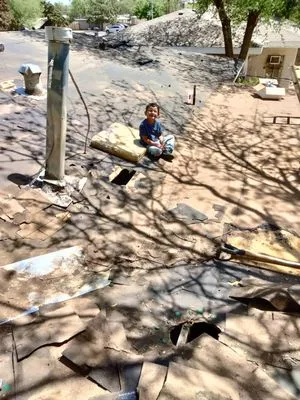 Reynas Roofing Remodeling Logo