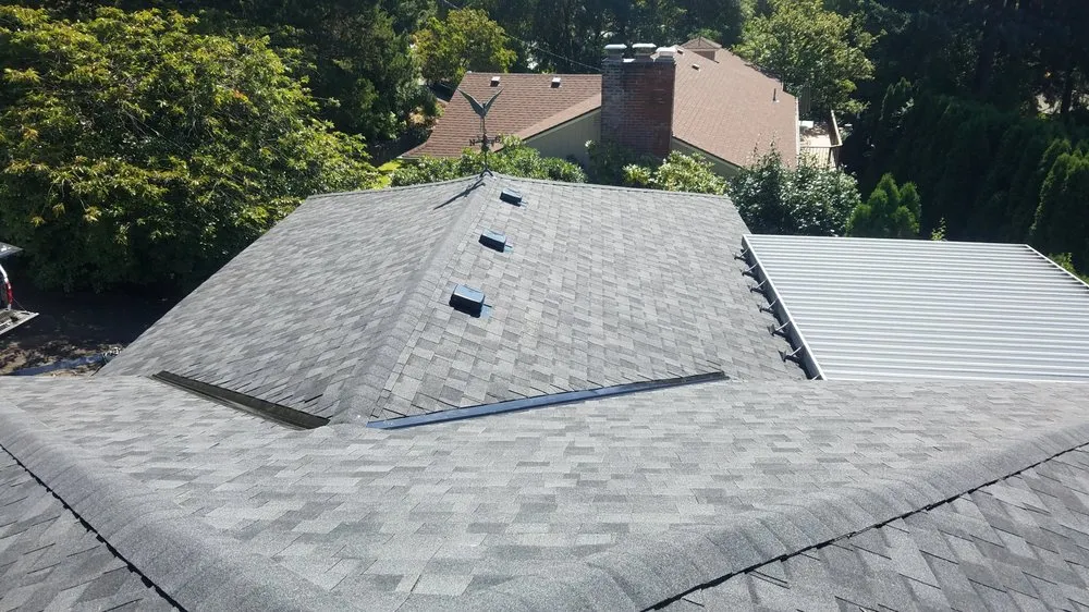 Slide of Reynolds Roofing and Construction