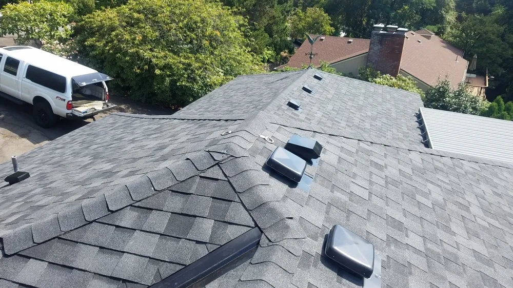 Slide of Reynolds Roofing and Construction