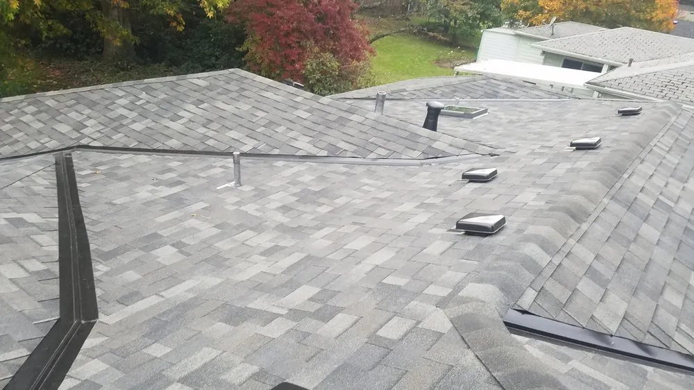 Slide of Reynolds Roofing and Construction