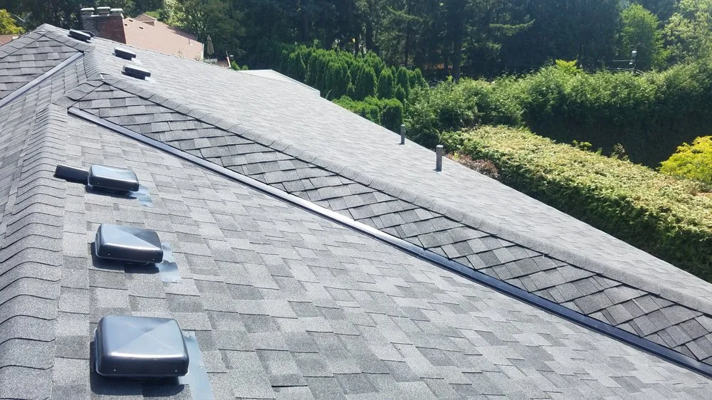 Slide of Reynolds Roofing and Construction