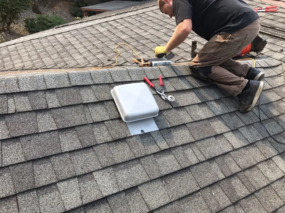 Slide of Reynolds Roofing and Construction