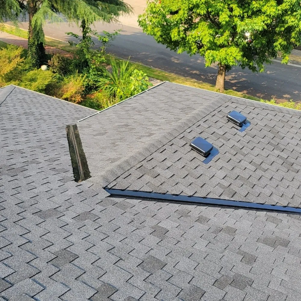 Slide of Reynolds Roofing and Construction