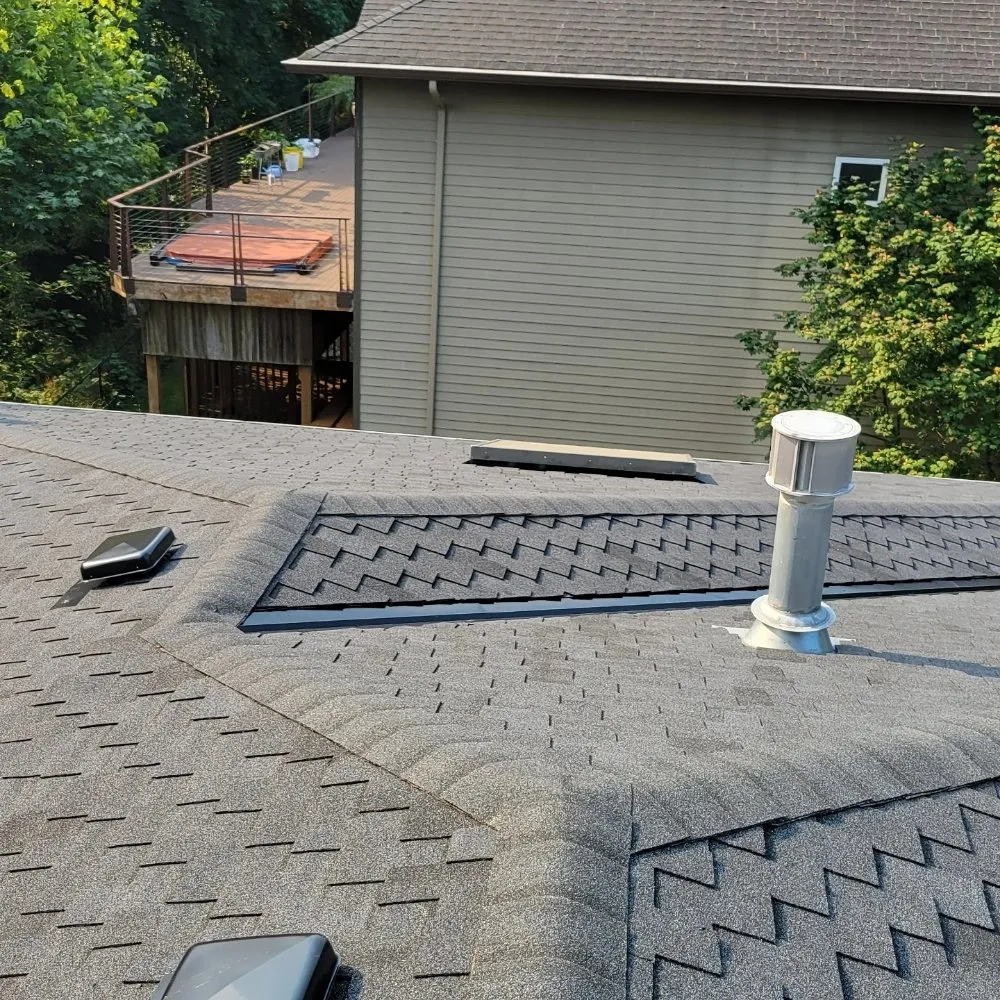 Slide of Reynolds Roofing and Construction