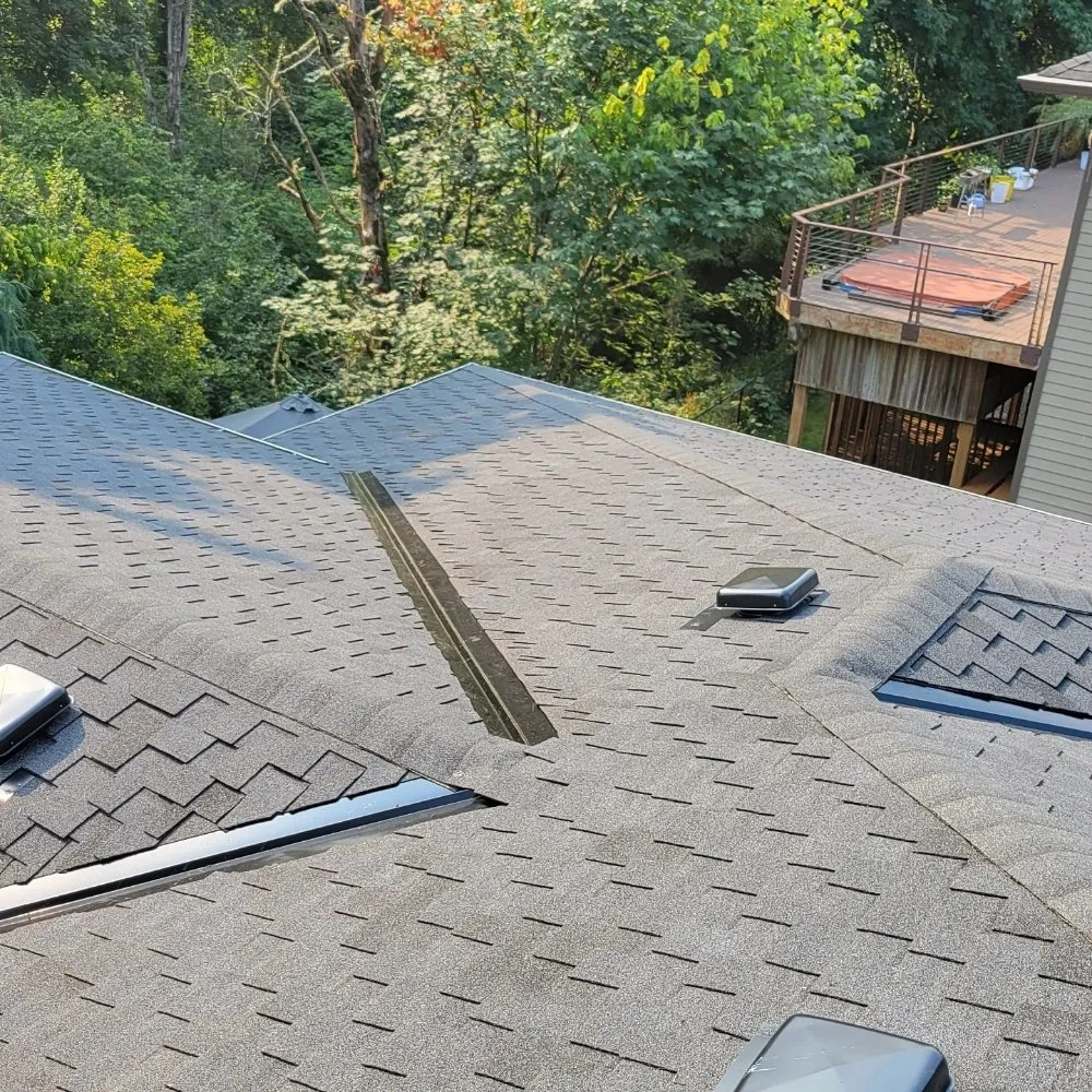 Slide of Reynolds Roofing and Construction