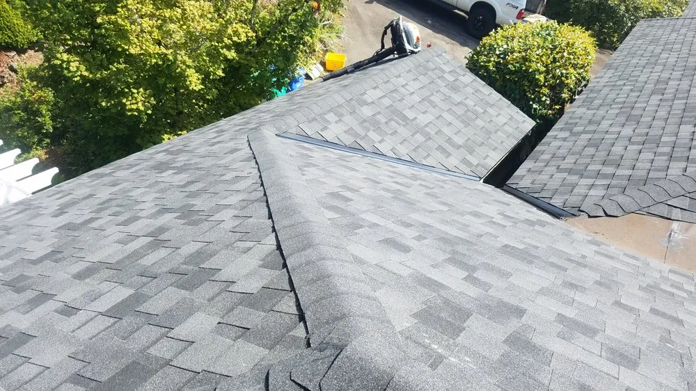 Slide of Reynolds Roofing and Construction